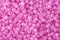 Pink polished beads background