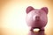 Pink porcelain piggy bank, concept of savings