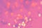 Pink-purple abstract bokeh background. Beautiful sparkling color festive texture