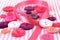 Pink and purple haberdashery buttons and craft ribbon