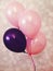 Pink and purple helium party balloons