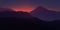 Pink and purple twilight in the mountains. Realistic vector illustration.