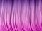 Pink purple violet lilac colorful stripes, waves, lines, curls and bumps. Abstract beautiful background. Soft voluminous