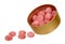 Pink raspberry candies in metal box. Delicious fruit caramel sweets in container