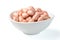 Pink raw peanut kernel in the china bowl