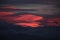 pink red clouds in sunrise mountain mitsikeli in winter moring ioannina greece