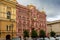 Pink and red historical building Bazin House in Russian style. Decorative facade with turrets, windows, stucco. Saint-Petersburg,