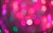 Pink and red holiday bokeh. Abstract Christmas background