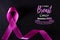 Pink ribbon on black paper background for supporting breast cancer awareness month campaign