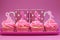 Pink ribbon cupcakes with polka dot coffee mugs