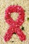 Pink ribbon made with flowers