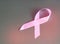 Pink ribbon to raise awareness of breast cancer, the image on a gray background, copy space