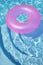 Pink Ring Floating in a Blue Pool