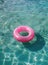 Pink Ring Floating on Water