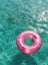 Pink Ring Floating on Water