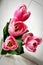 Pink romantic tulip flowers having sun