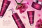 Pink rose cosmetics series vector illustration, 3d plastic cosmetic bottle with pump dispenser for body moisturizer