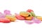 Pink rose petals and macaron cookies