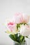 Pink roses bouquet, soft delicate roses closeup, spring roses bouquet in a vase