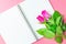 Pink roses decorative with blank notepad on top view flat lay for your text,for valentine and wedding sweet love concept vintage