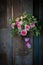 Pink roses on a old wooden cabinet