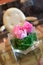 Pink roses table centrepiece in hotel lobby