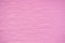 Pink rough fabric background. display free space and top view. you can add text or products for presentation. texture sweet design