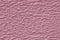 Pink roughened, bumpy texture background