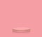 Pink round pedestal podium and pink background.Mirror reflection base.For place goods,cosmetics,cartoon model,design fashion,food,