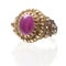Pink ruby on gold ring , Traditional production