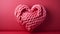 Pink sailor rope rolled into a heart shape on a solid pastel background. Heart-shaped sailor knots.