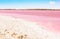 Pink Salt lake and the shore is covered with salt. Torrevieja, Spain