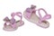 Pink sandals isolated. Close-up of cute pink sandals with a bow for the little girl isolated on a white background. Trendy summer