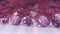 Pink sapphires diamonds of various sizes are centered on a white background