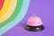 Pink service bell on colorful background copy space