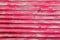 Pink sheet metal background