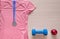 pink shirt, red apples, sports, clothing, top view, medal, dumbbell, blue, flat lay