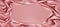 Pink silk draped fabric background with glittering