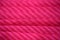 Pink silky cloth material background for fashion designers and dressers.