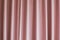 Pink silky satin curtains drapery background for presentation.