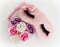 Pink sleeping mask and little heart made of fabric flowers