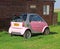 Pink smart car