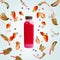 Pink smoothie bottle with flying berries and chard leaves on light blue background. Healthy detox beverages