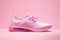 Pink sneaker isolated on pastel pink background, woman sport shoe fashion, sneakers, trainers, sport lifestyle, running concept,