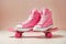 Pink sneakers on a pink skateboard