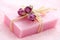 Pink soap with dried roses