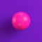 Pink soccer ball on purple background. Minimalism concept