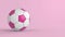 Pink soccer plastic leather metal fabric ball isolated on black background. Football 3d render illlustration