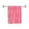 Pink soft terry towel hanging on metal holder attached to wall. Light red bathroom interior element.