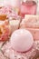 Pink spa set: scented candle, bath caviar, bar of soap and liquid soap